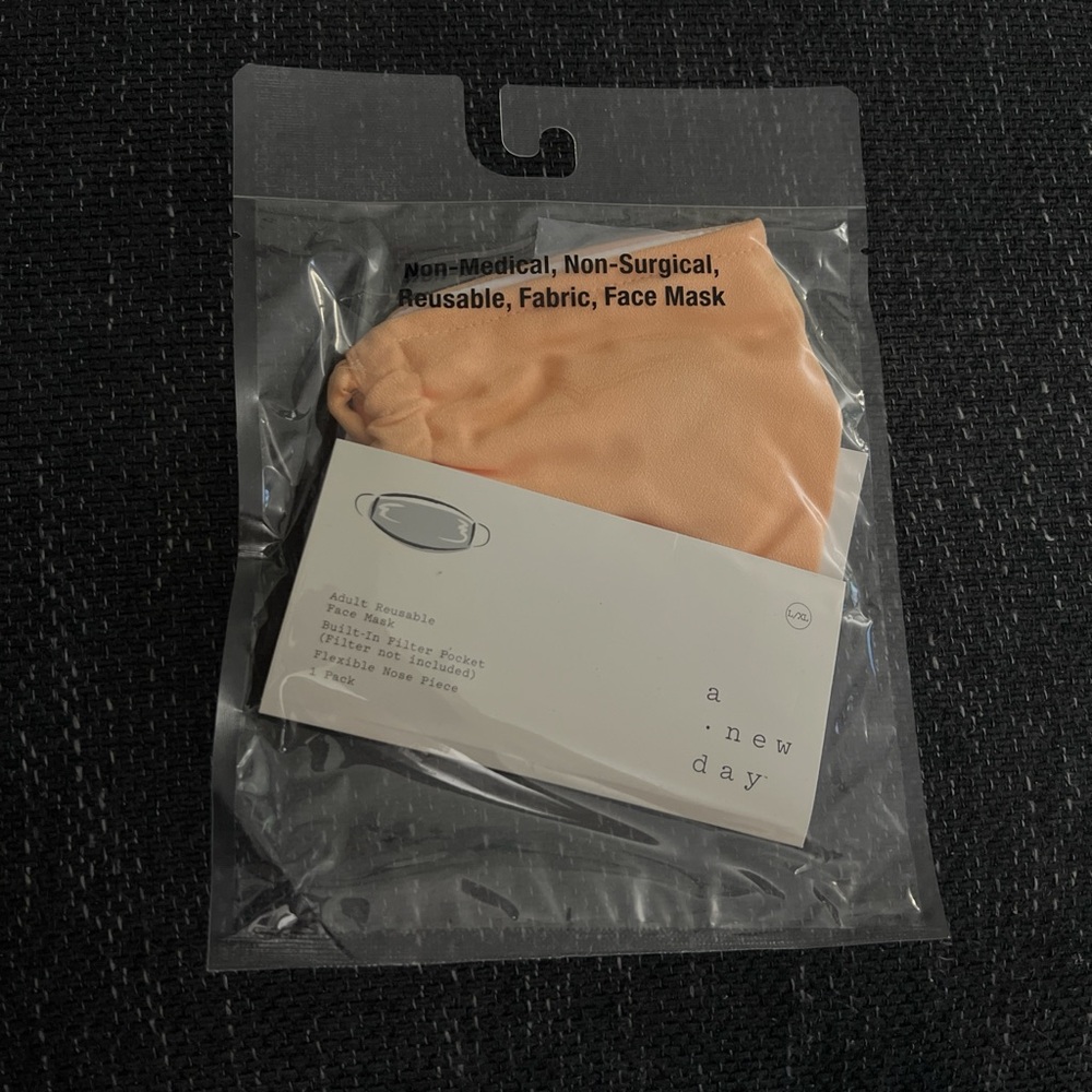 A New Day Light Orange Fabric Face Mask